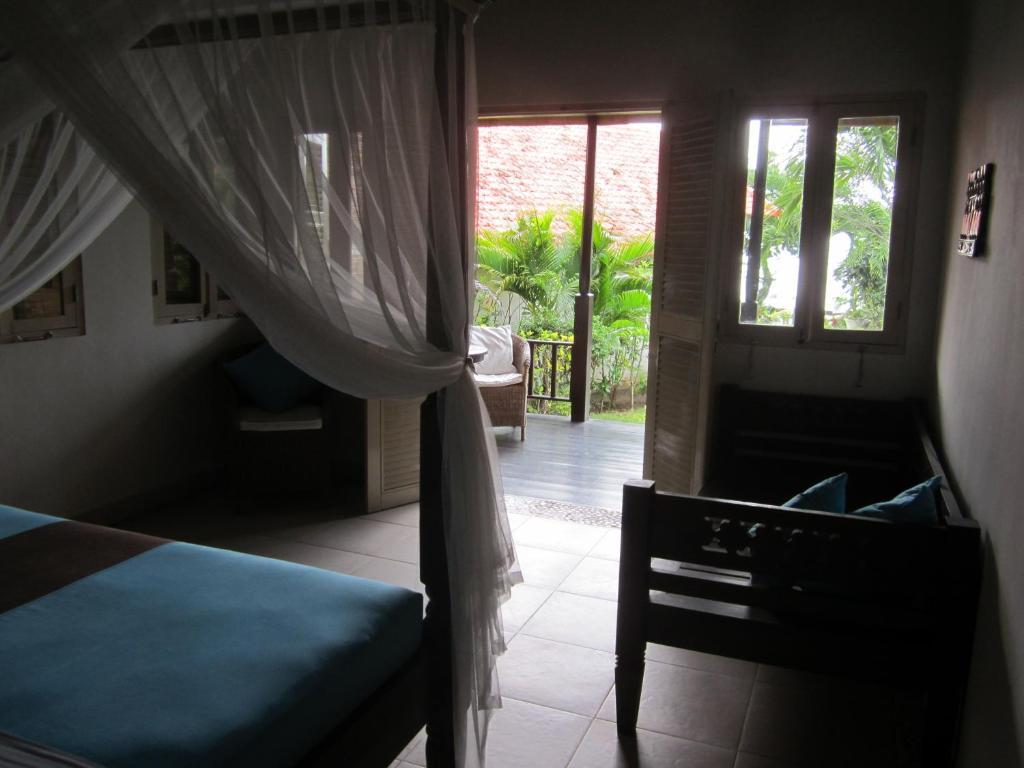 Kembali Beach Bungalows อาเม็ด ห้อง รูปภาพ